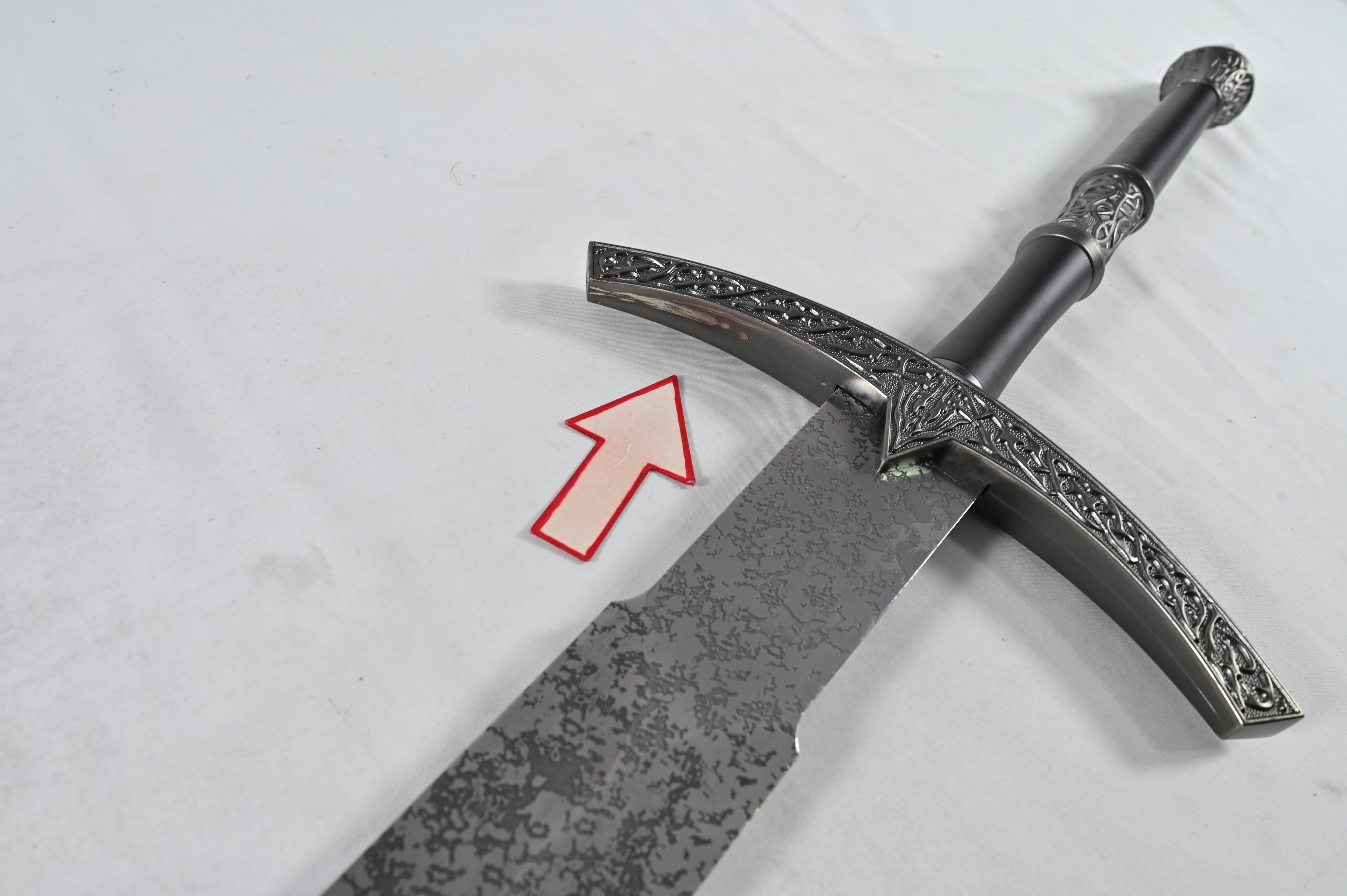 El Rey Brujo - empuñadura manchada, pomo dañado