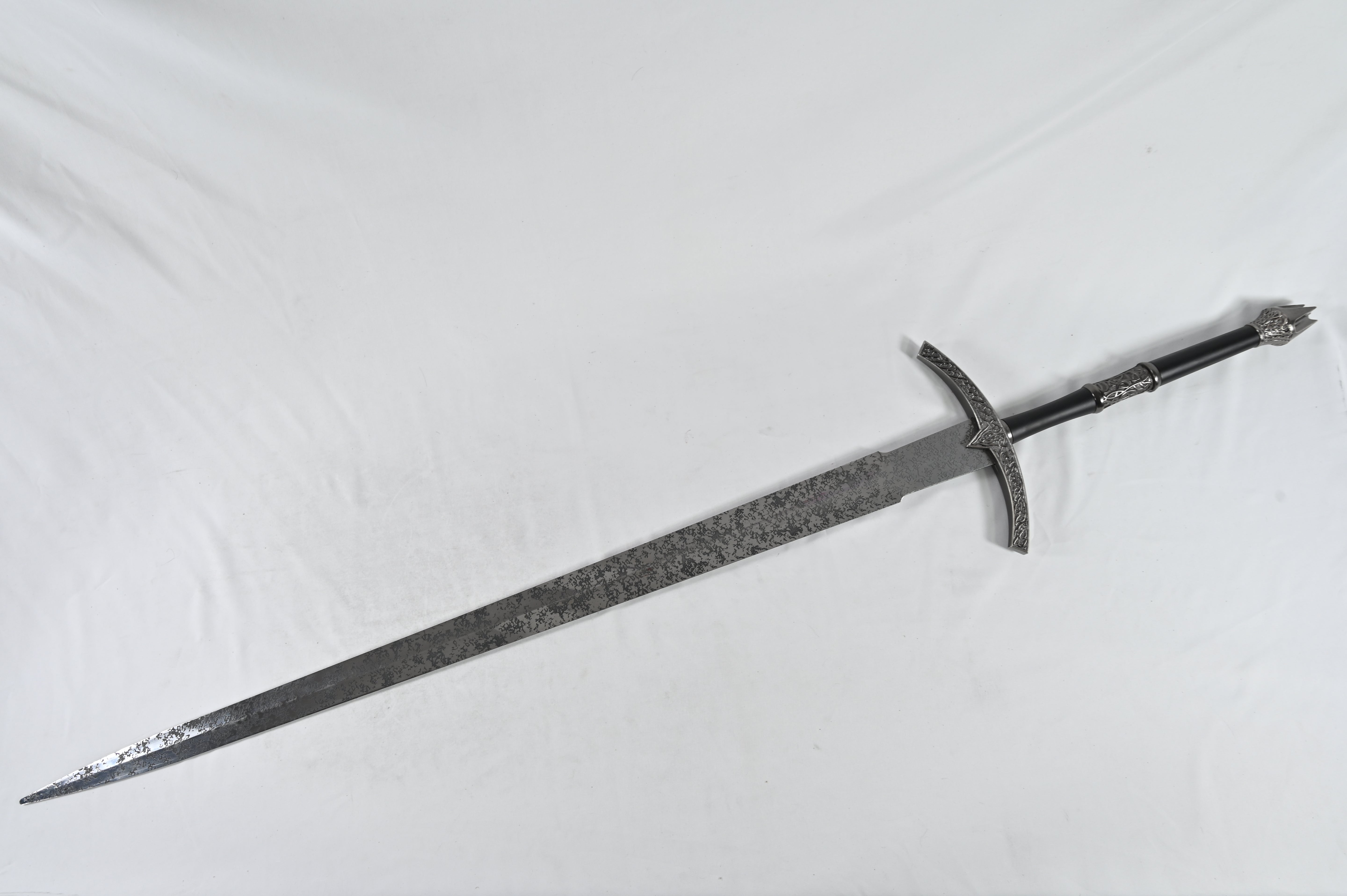 El Rey Brujo - empuñadura rayada, pomo dañado