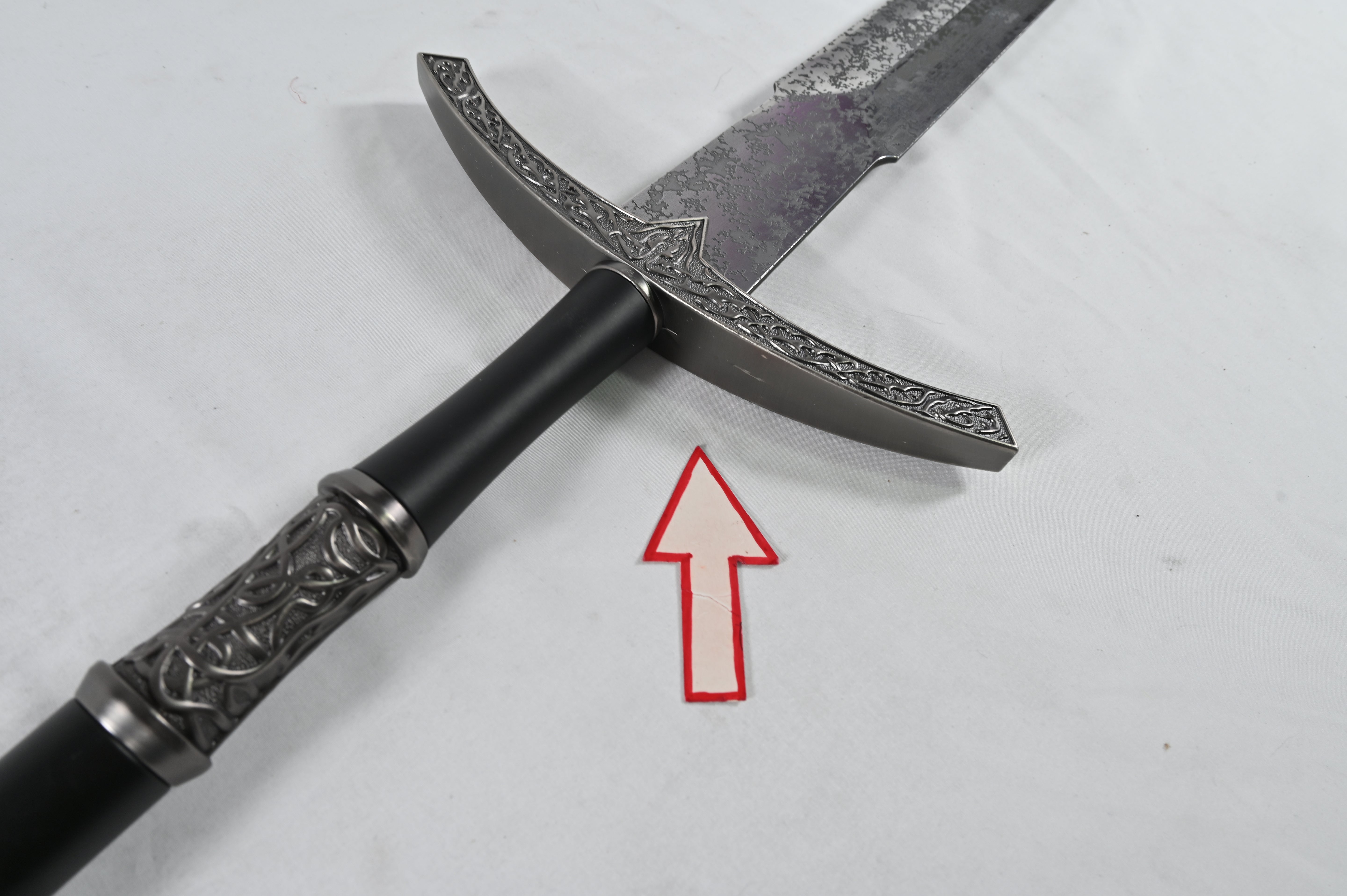 El Rey Brujo - empuñadura rayada, pomo dañado