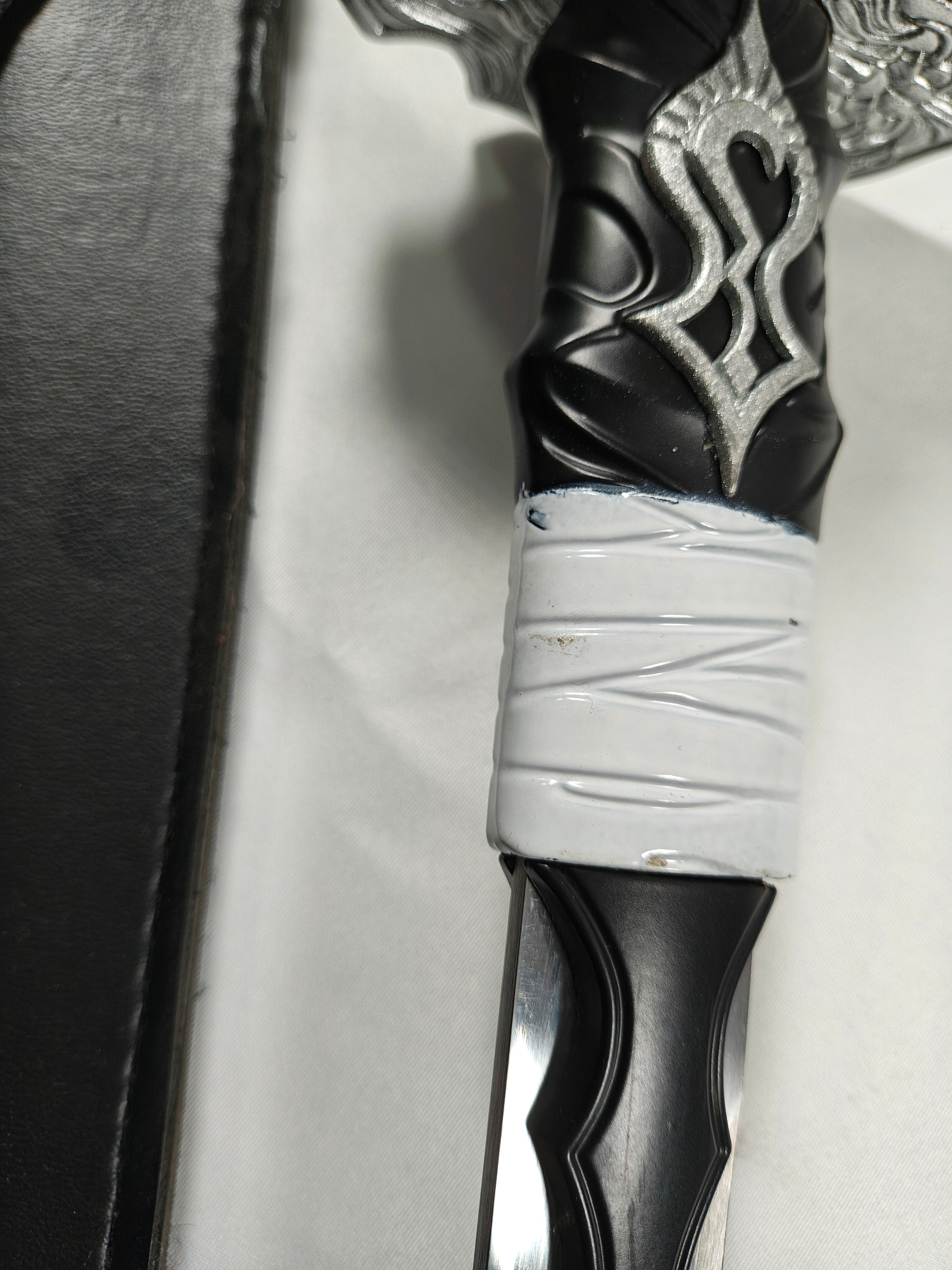 Contrato Virtuoso - hoja con óxido, habaki manchado