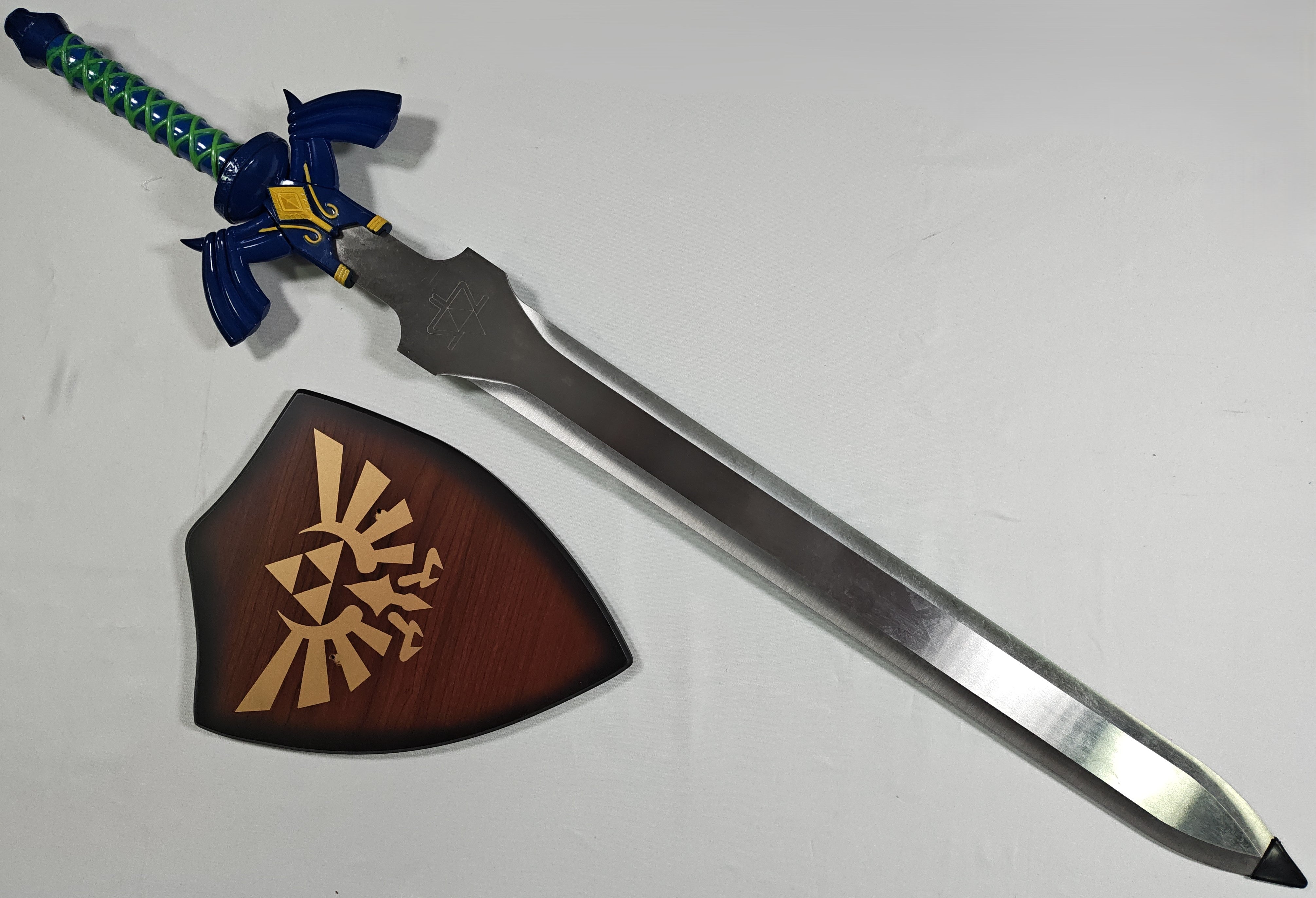 Elite Master Sword - mango mal pintado